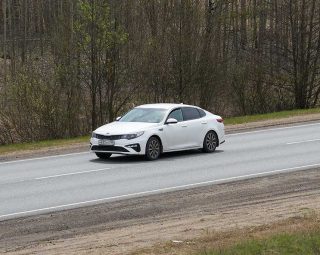 Ruzayevsky District, Mordovia, Russia - May 08, 2021: A front view on white Kia Optima