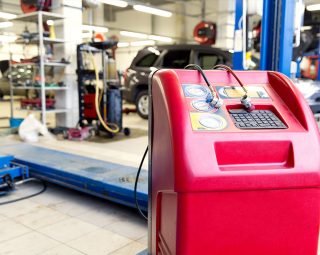 Car air conditioner charging machine at service station